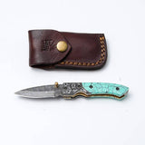 Turquoise Damascus Folding Knife – Hand Engraved Bolster
